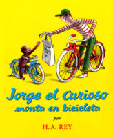 Jorge el Curioso monta en bicicleta